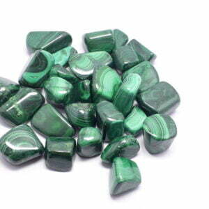 Malachite Stone Tumbles are small, polished stones made from the mineral malachite, featuring vibrant green hues and unique patterns, often used in crystal healing and decorative purposes