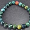"Radiant Ruby Fusion: Natural Stone Bracelet Collection"