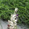 "Heavenly Harmony: 7 Chakra Angel Pendant"